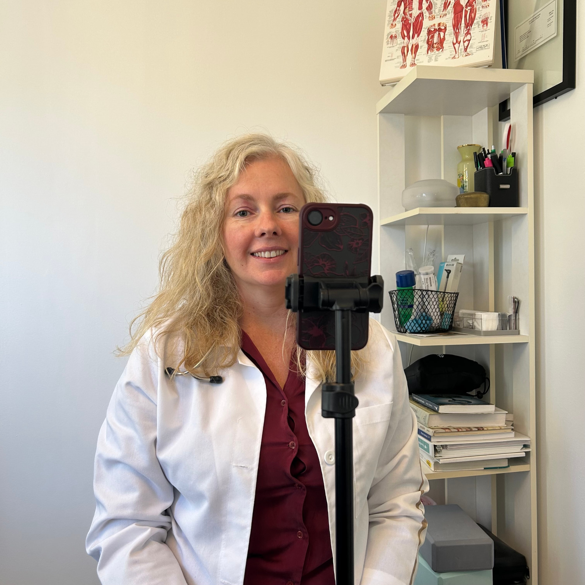 Dr. Andrea McSwain recording educational content in her clinic
